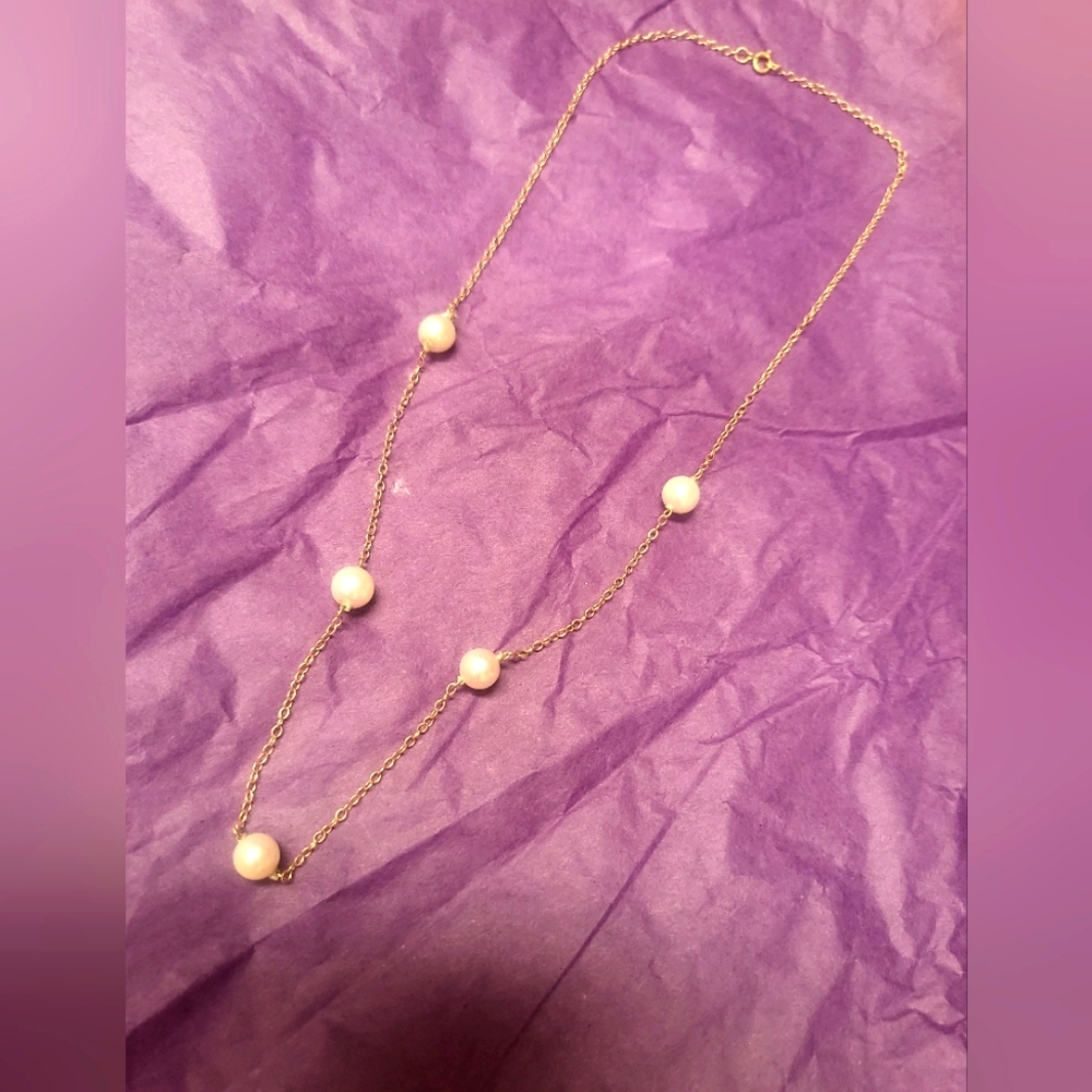 Dainty pearl necklace.